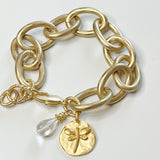 chunky gold chain bracelet with dragonfly and clear stone charm