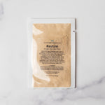 Restore face mask on a marble surface