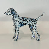 Dalmation dog shelfie featuring painted artwork encased in a thick clear freestanding block on white background