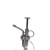 Metallic oil sprayer on a white background
