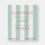 Book cover of 'Everybody Loves Stripes' with vertical stripes and text on a light gray background
