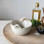 styled cream stoneware batter bowl with wooden mini whisk set