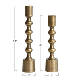 Antique gold cast aluminum taper holder with turned column design, available in 8” and 9.5” heights, shown on white background.