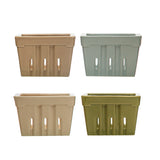 Four rectangular berry baskets in beige, green, and brown on a white background