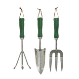 Set of three gardening tools with green handles on a white background