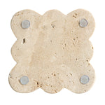 back view of travertine scalloped coaster