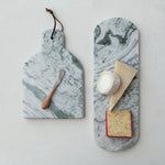 styled emerson marble cutting boards, available in two styles