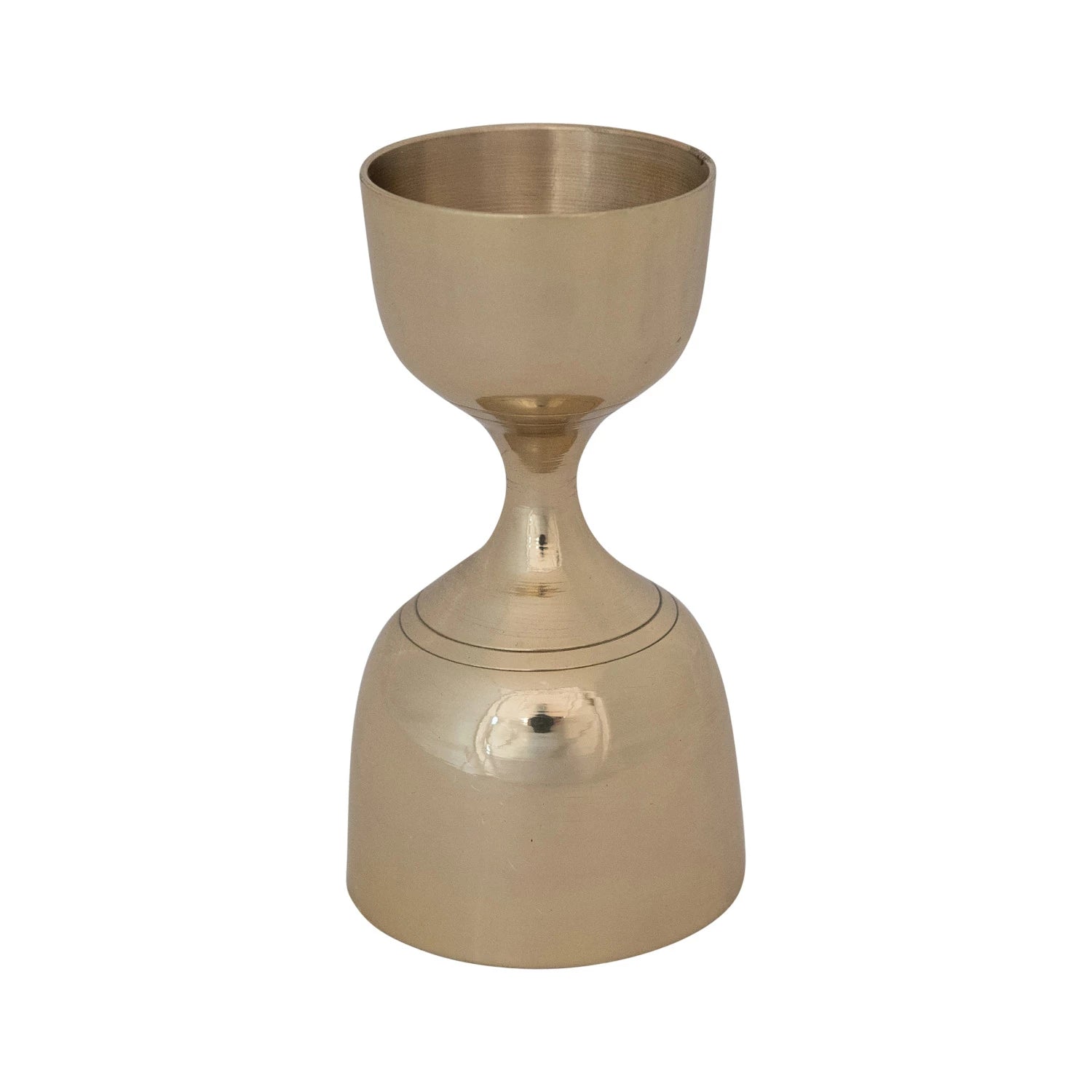 Gold hourglass-shaped jigger on a white background