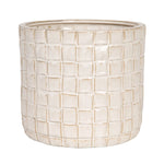 Decorative pot with a grid pattern on a white background