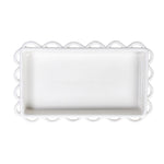 Rectangular white napkin holder with scalloped edge on a white background