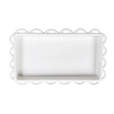 Rectangular white napkin holder with scalloped edge on a white background