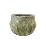 Green textured pot on a white background