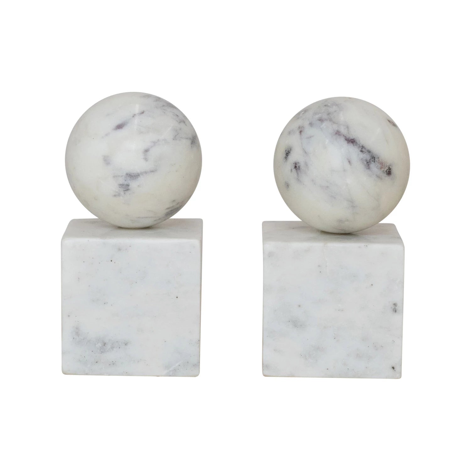 Two marble spheres bookends on square bases against a white background
