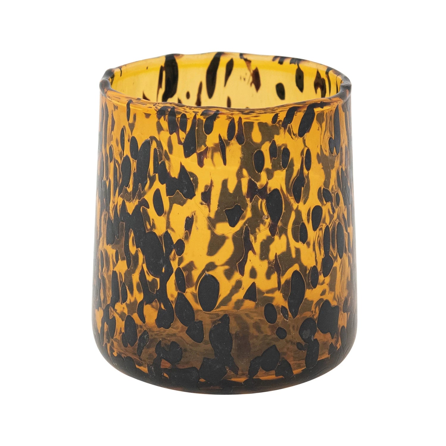 Tortoiseshell-patterned drinking glass on a white background