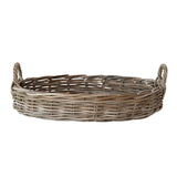 Wicker basket with handles on a white background