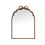 Decorative wall mirror with a gold frame on a white background