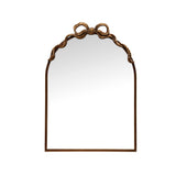 Decorative wall mirror with a gold frame on a white background