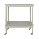 A light gray two-tier rolling bar cart with gold-tone casters and brass hardware, shown against a plain white background.