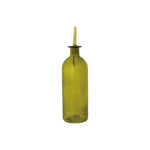 Green glass bottle with a gold cap on a white background