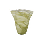 Green glass vase with swirling pattern on a white background