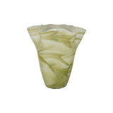 Green glass vase with swirling pattern on a white background
