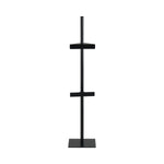 Black metal easel with multiple shelves on a white background