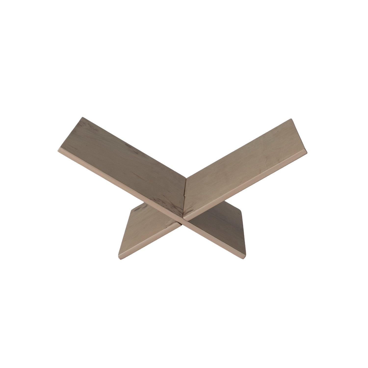 Metallic X-shaped object on a white background