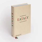 Beige book titled 'Eataly: Contemporary Italian Cooking' by Phaidon on a white background