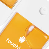 Orange packaging with 'touch!' branding on a white background