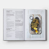 Open cookbook showing a recipe for Nori Seaweed and Egg Fritters with a photograph of the dish on a white background.