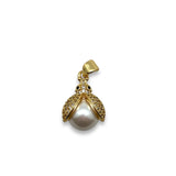Gold pendant with a pearl on a white background
