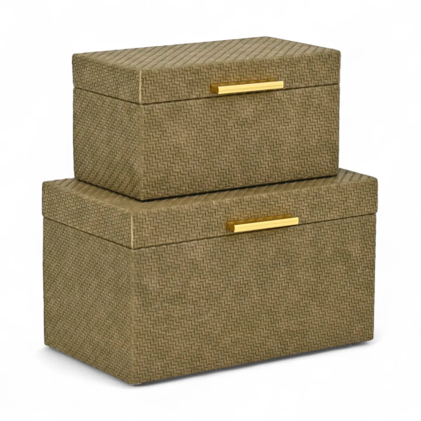 Two woven storage boxes with gold handles on a white background