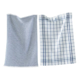 Two textured cloths, one with a woven pattern and the other with a checkered pattern, on a white background.