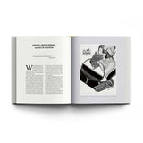 Open book with Hermès advertisement on a white background