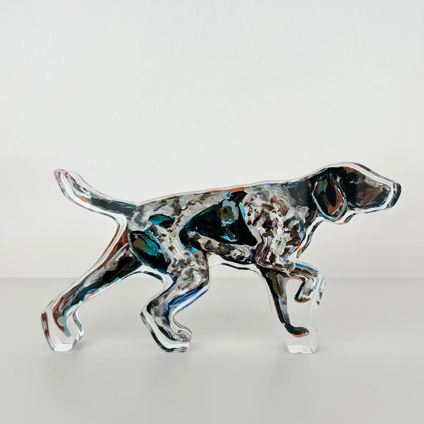 German Shorthaired Pointer dog shelfie featuring painted artwork encased in a thick clear freestanding block on white background