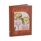 Book titled 'Kindred Spirits' with cocktail illustrations on a white background