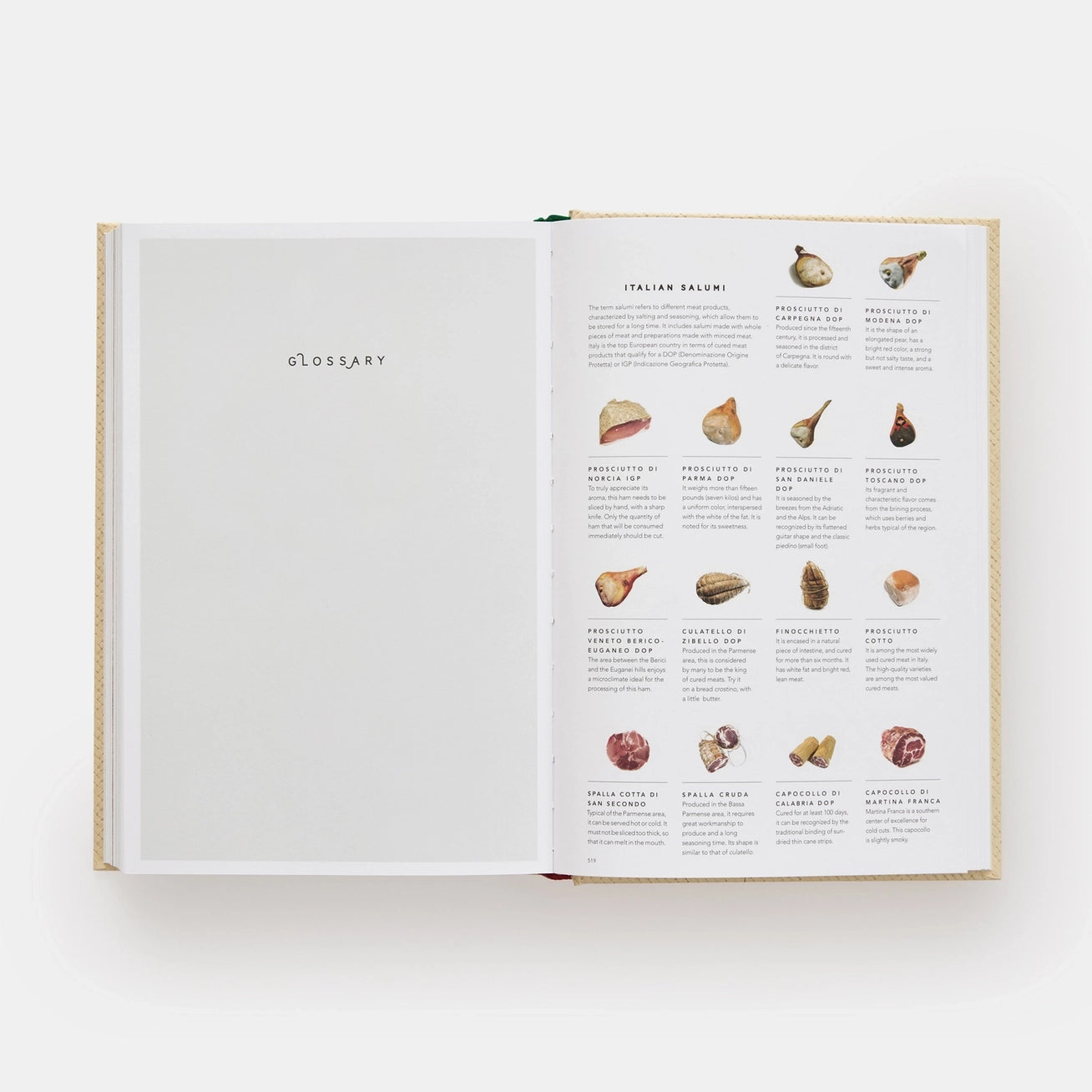 Open book showing a glossary with illustrations of food items on a white background