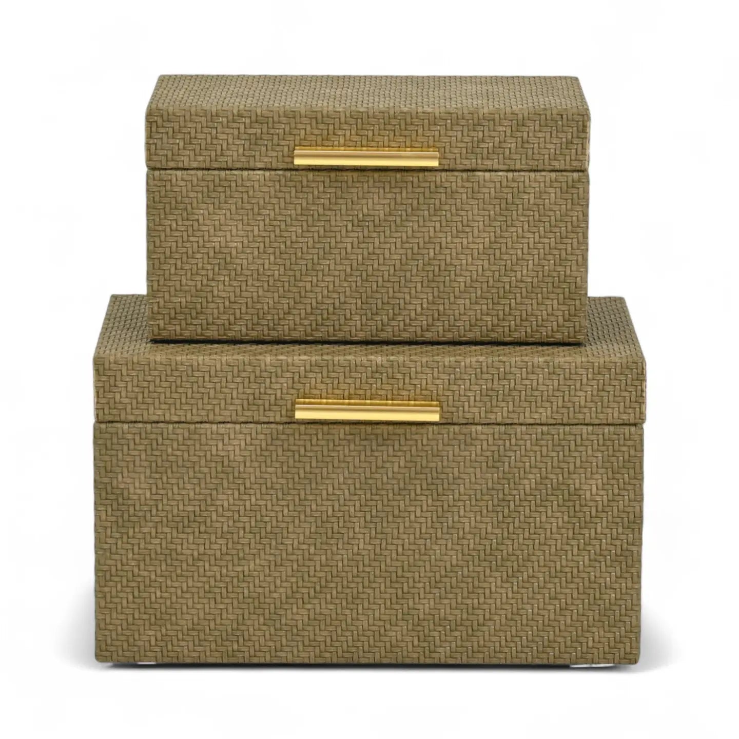 Two woven storage boxes with gold handles on a white background