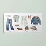 Illustrated children's book open to a page titled 'In the Closet' with clothing items on a light green background.