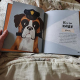Open book with illustration of a dog in a police uniform and text on a floral fabric background