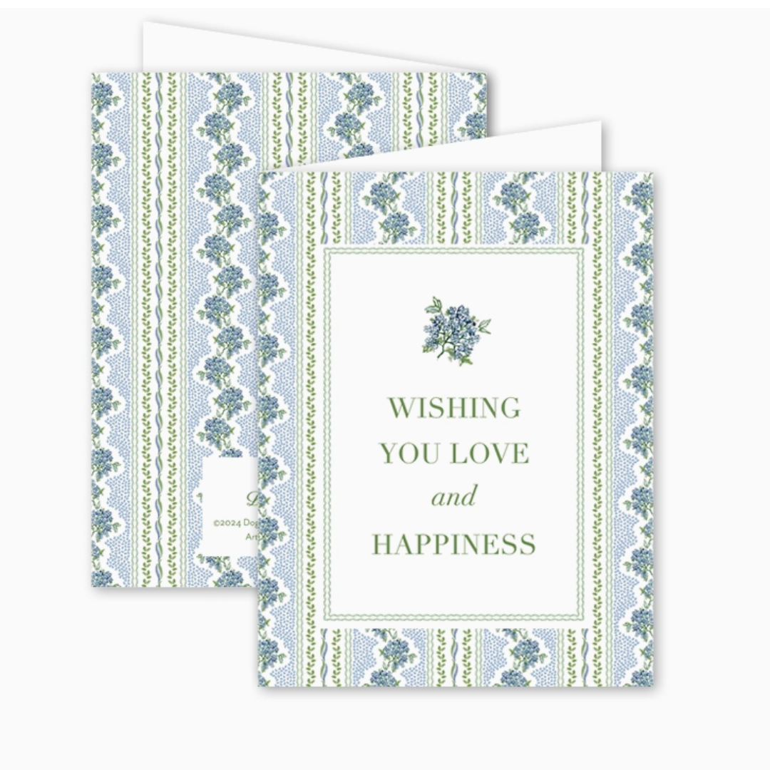 Front and back view of a folded greeting card featuring a blue and green hydrangea floral border and the message “Wishing You Love and Happiness” on the front; card is blank inside and paired with a Euro flap envelope.