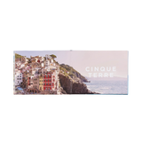 Panoramic view of Cinque Terre with colorful buildings and ocean.