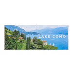Framed artwork of Lake Como with scenic view and 'Lake Como' text.