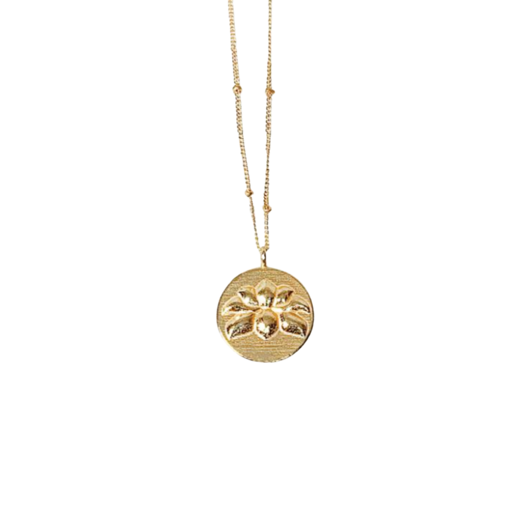 18K gold necklace with circular gold pendant with lotus design