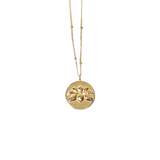 18K gold necklace with circular gold pendant with lotus design