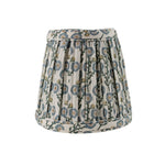 Floral patterned lamp shade on a white background