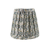 Floral patterned lamp shade on a white background