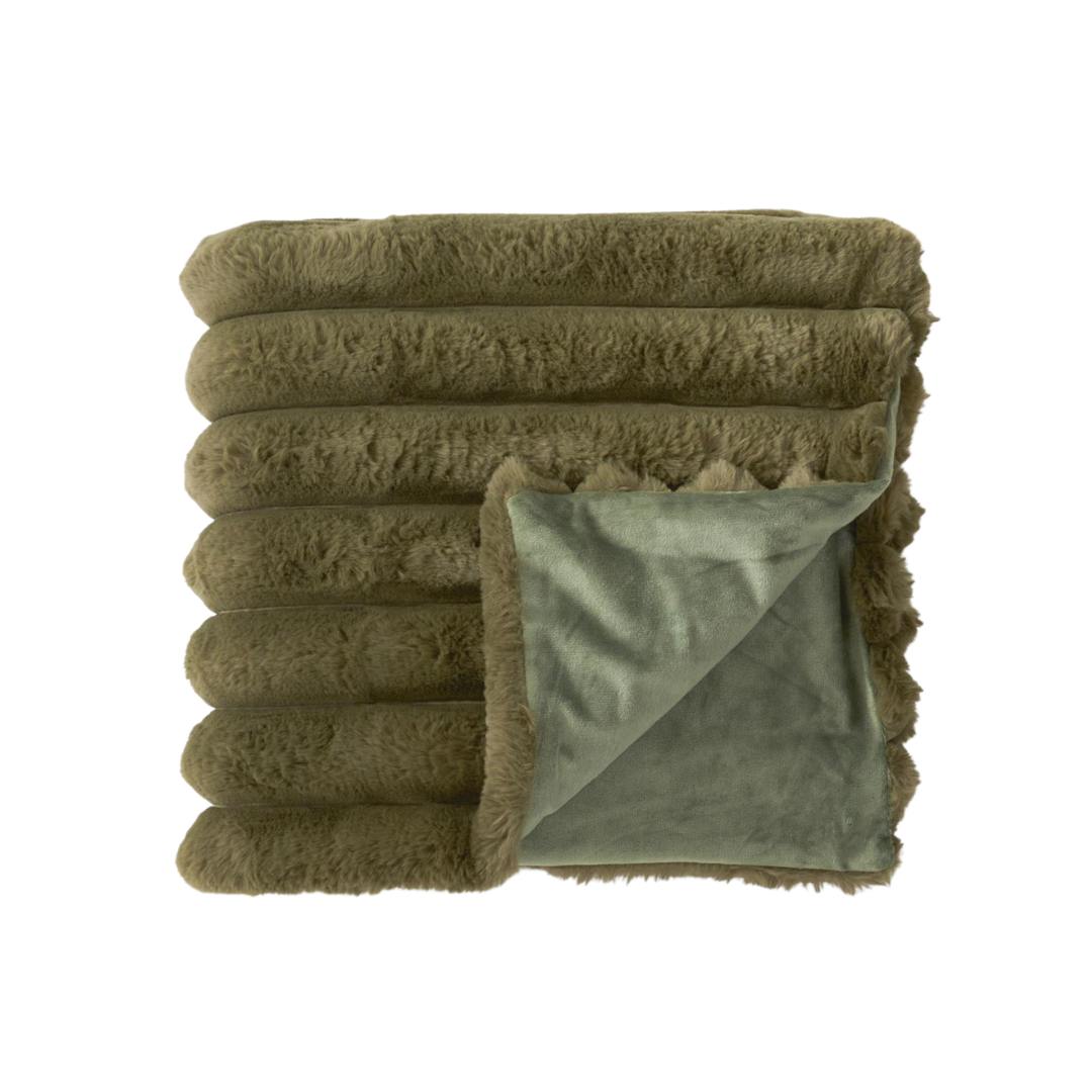 Folded green blanket with a soft texture on a white background