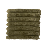 Stack of green towels on a white background