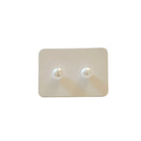 white dainty pearl stud earrings